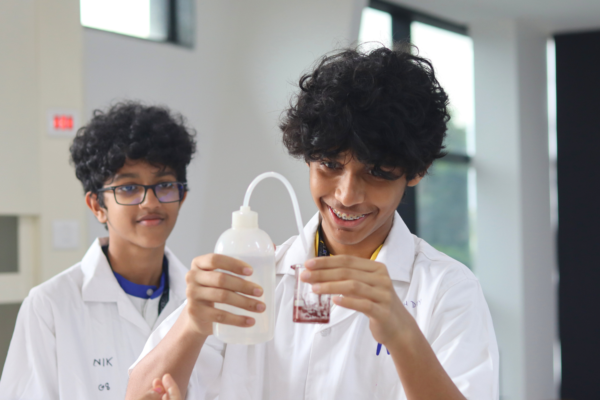 Students using technology and critical thinking
